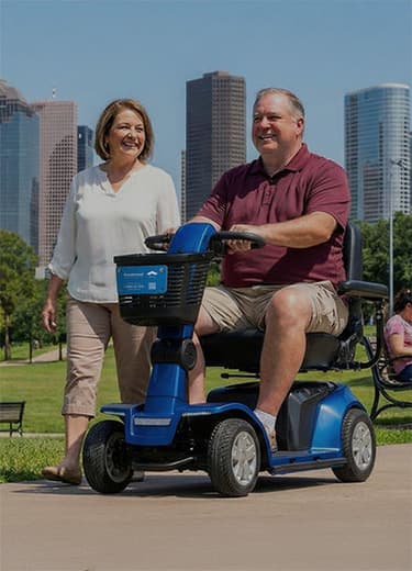 A old  man using a mobility scooter in Houston